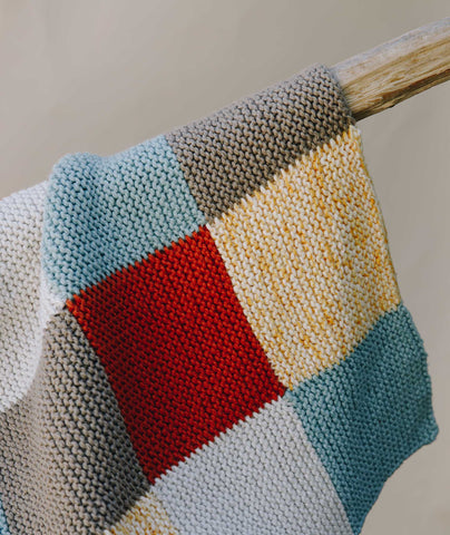 Garter Blocks Baby Blanket: 5-Color Version Using Blue Sky Fibers Printed and Organic Cotton Worsted
